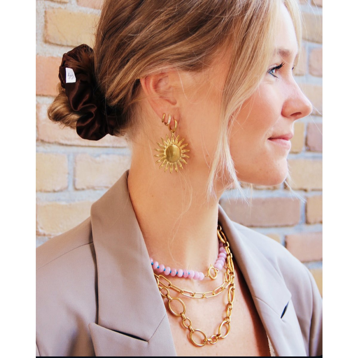 Earring with XL sun