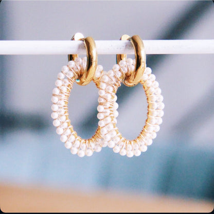 Wide earring with oval facet pendant – pearls