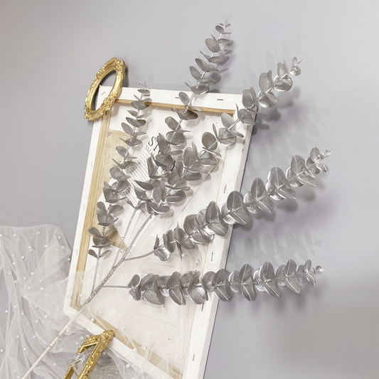 FLEUR DECORATIVE FEUILLES D'EUCALYPTUS ARGENT H90CM