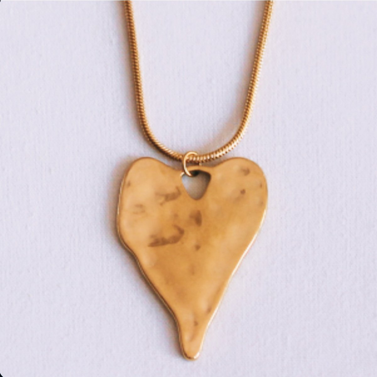 Long snake necklace with XL heart
