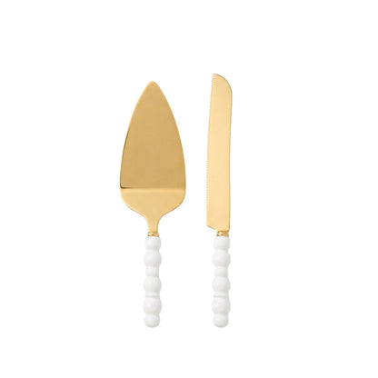 Golden pastry set with white ball porcelain handles