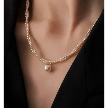 Twisted Pearl Strand Pendant Necklace
