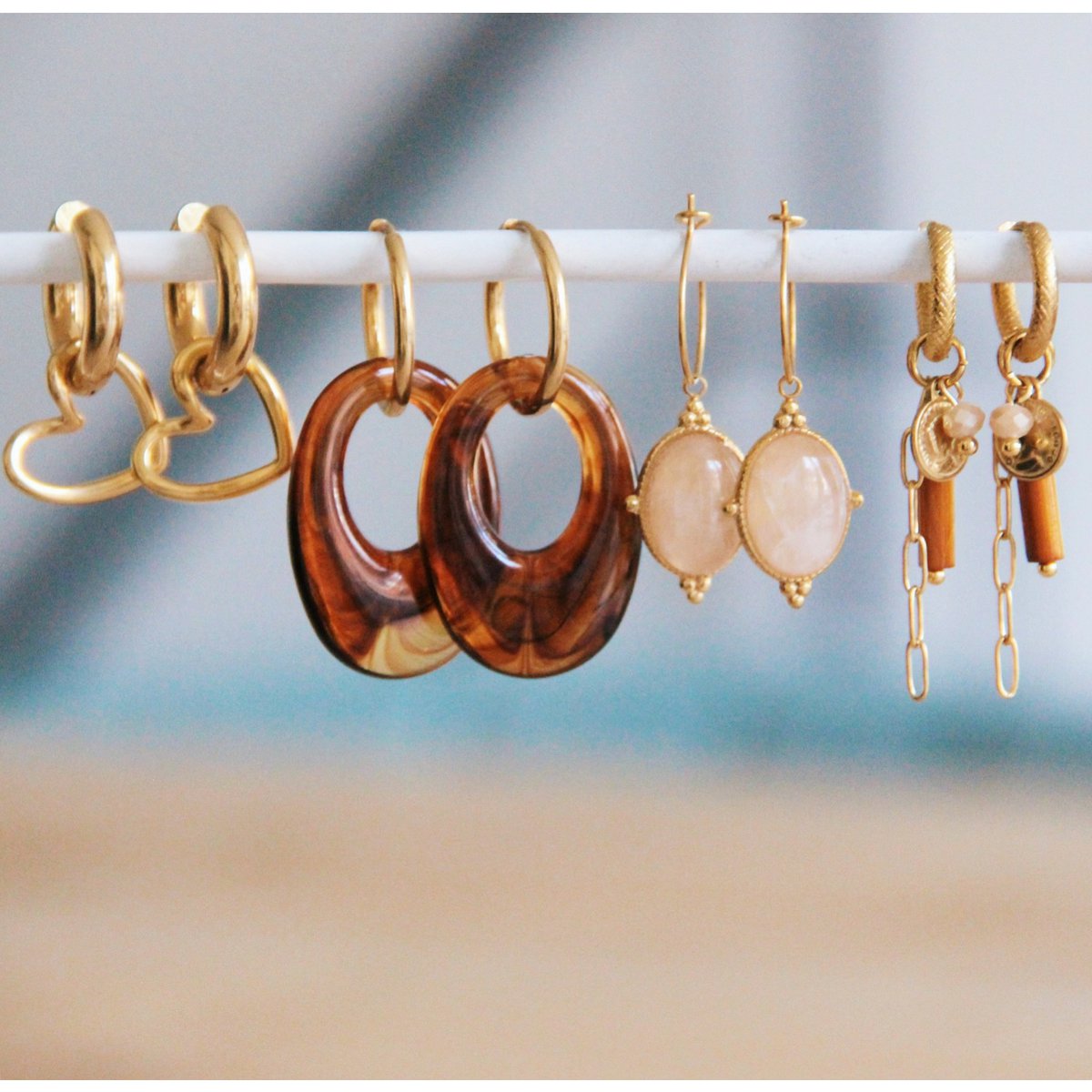 Stainless steel wide creole with open heart - gold