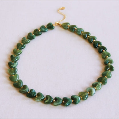 Beaded necklace of hearts resin - green