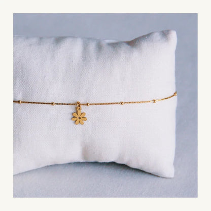 Fine anklet with daisy flower – gold