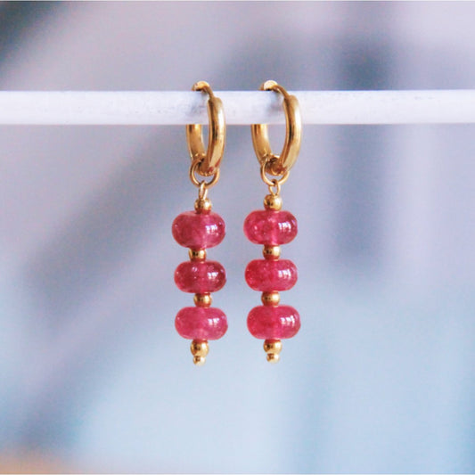 Stainless steel hoop earrings with donut gemstones - cerise
