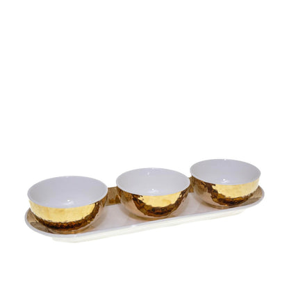 Set of 3 white and golden cups on set