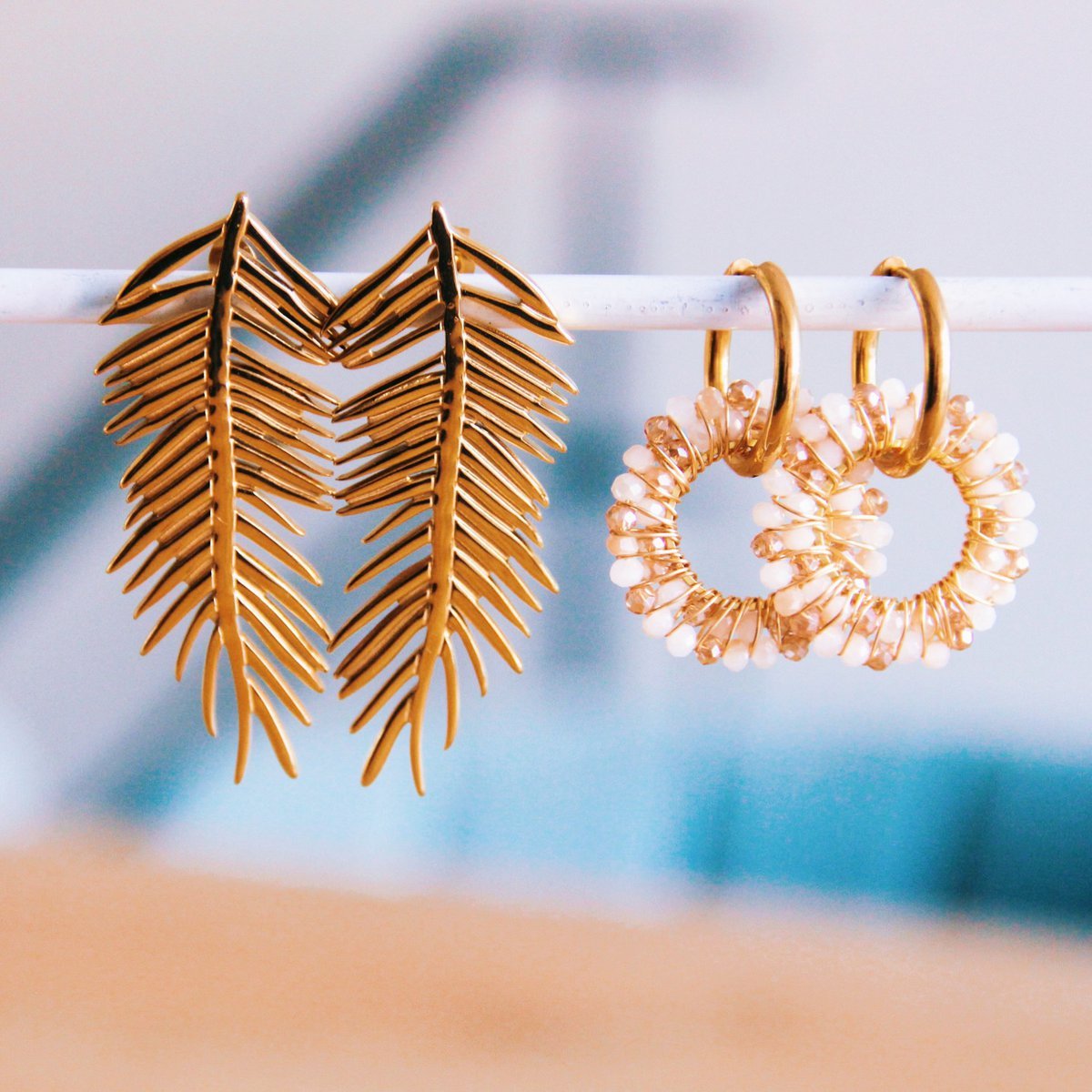 Stainless steel earring with round facet pendant – nude shades