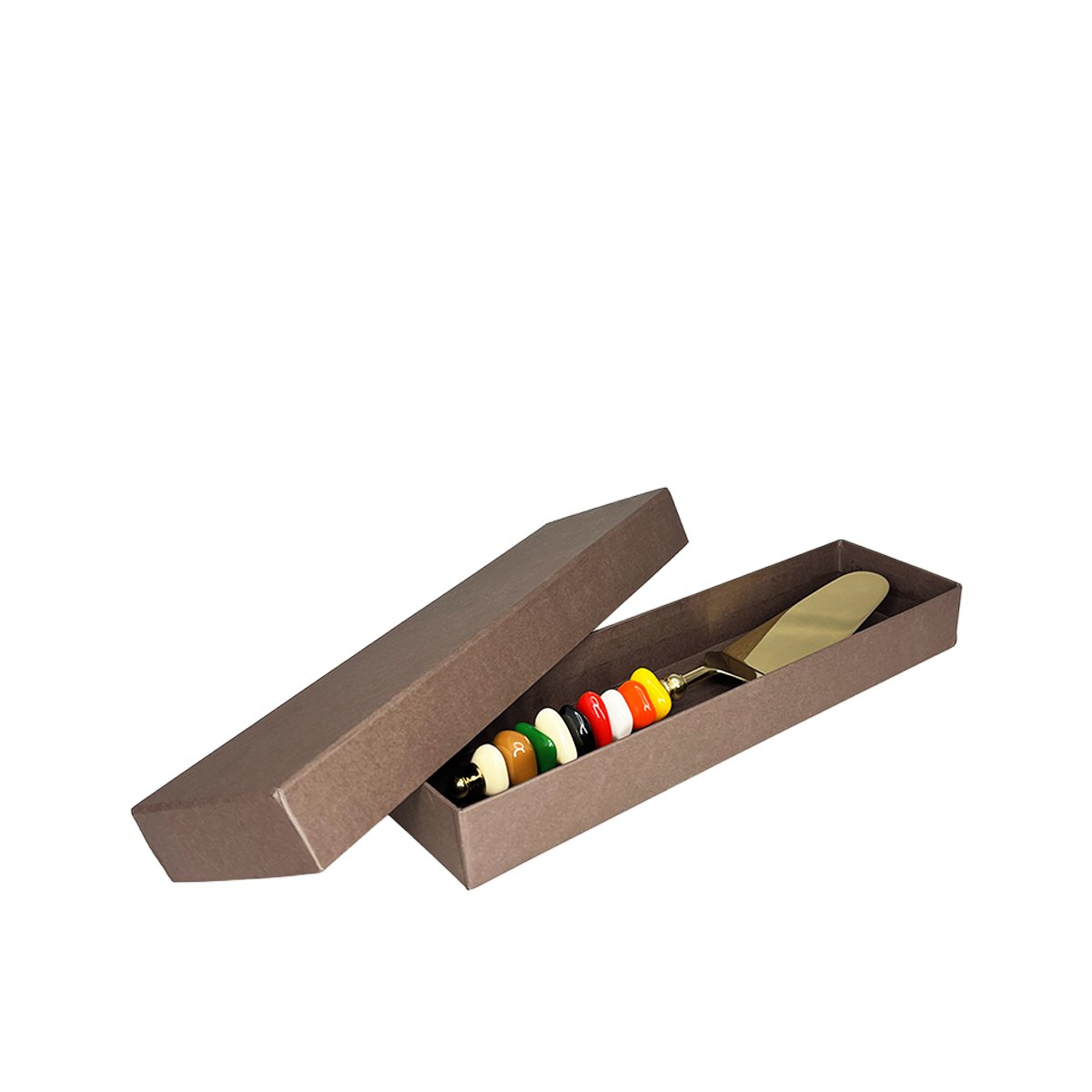 Golden pie server with multi-colored stone handle