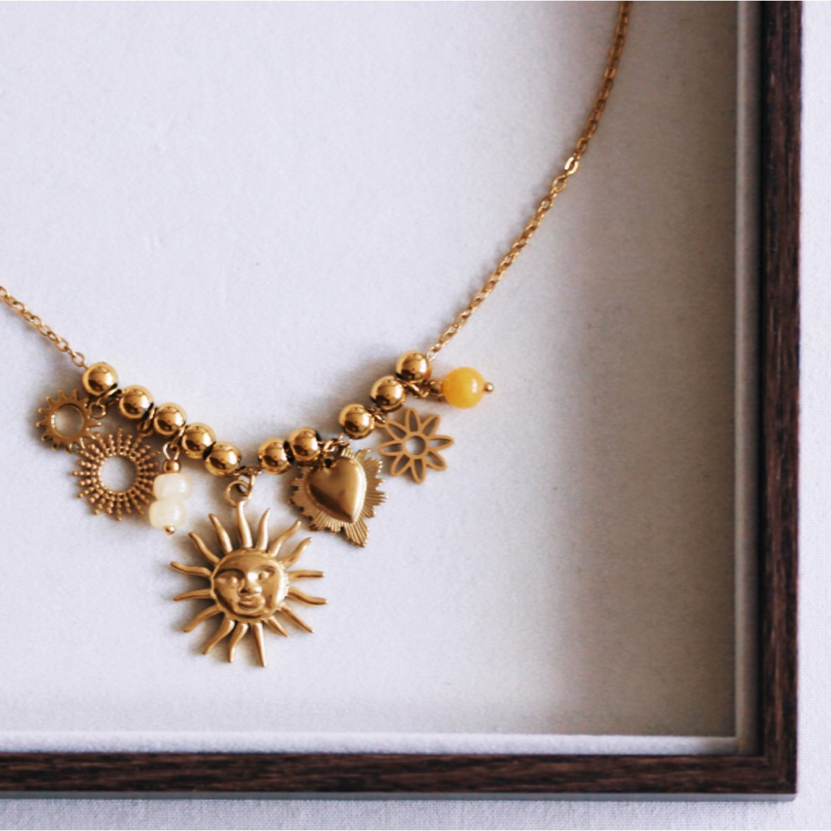 Beaded necklace with charms ‘Kissed by the Sun’