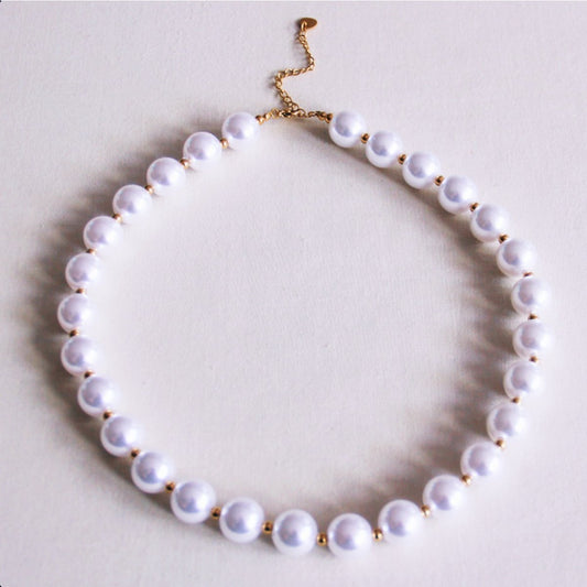 Pearl necklace with gold-colored beads