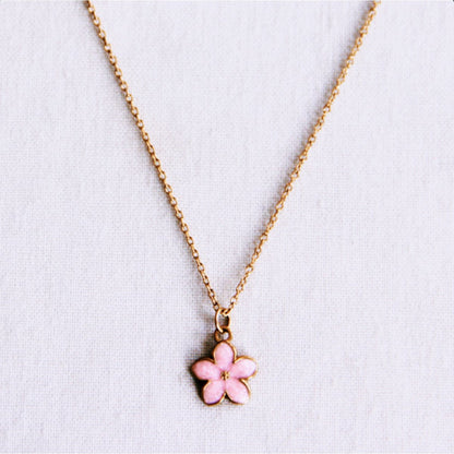 Delicate necklace with a pink flower