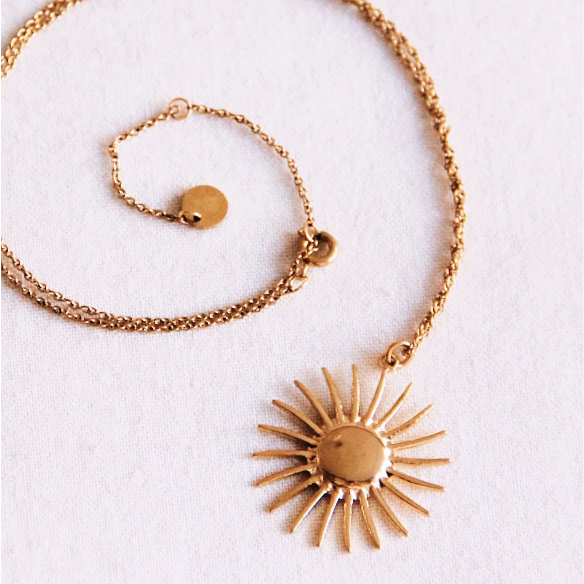 Fine necklace with sun