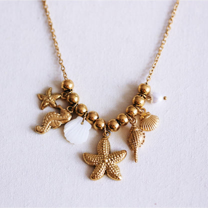 Beaded necklace with ‘Salt & Sea’ charms