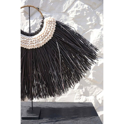 The Alang Cowrie on Stand