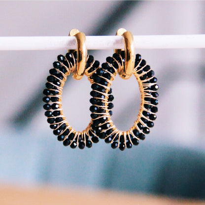 Wide earring with oval facet pendant – black