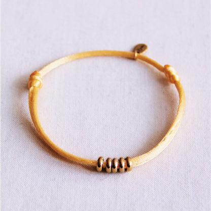 Satin bracelet with rings – yellow/gold