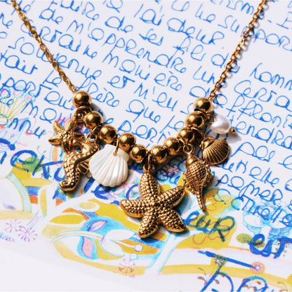 Beaded necklace with ‘Salt & Sea’ charms