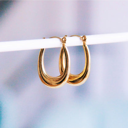 Stainless steel oval earring flared