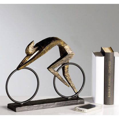 Poly/metal sculpture "Racer" bronze colored L.36.5/H28.5