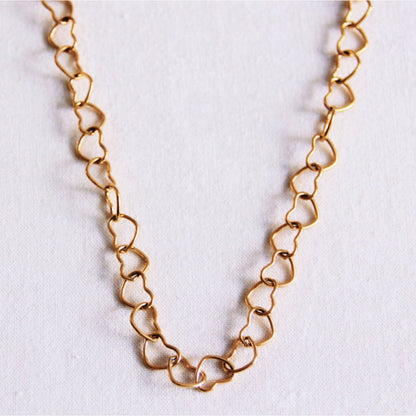 Linked hearts necklace