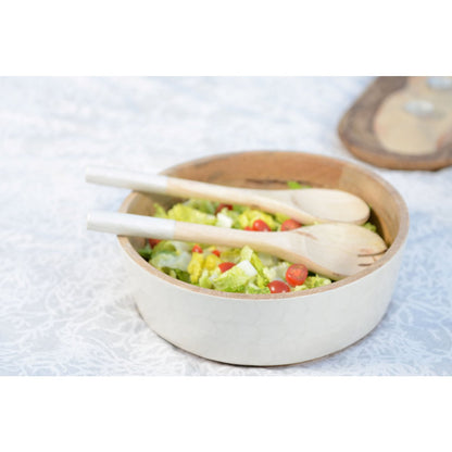 Saladier and white salad and mango salad cutlery