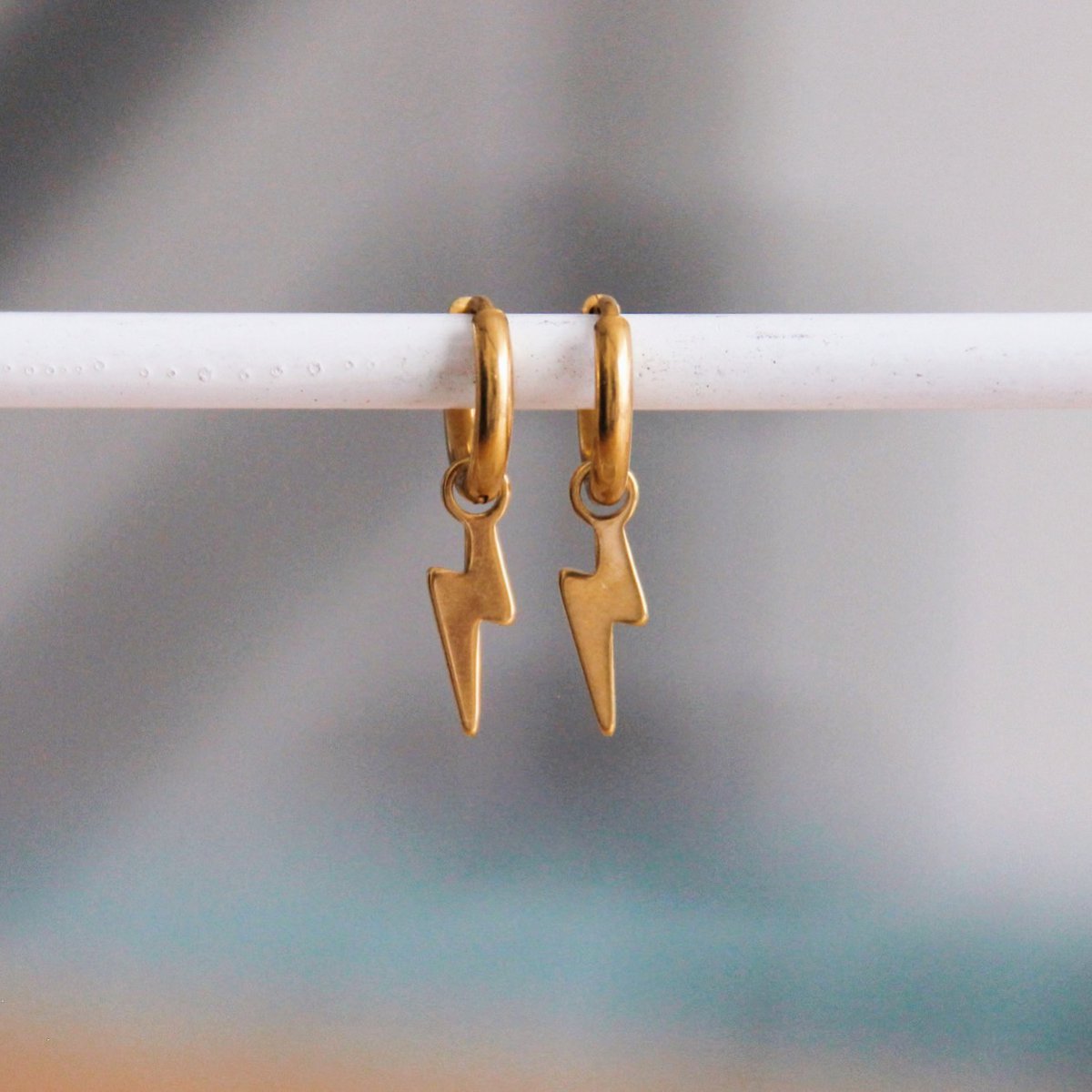 Stainless steel creoles with lightning - gold