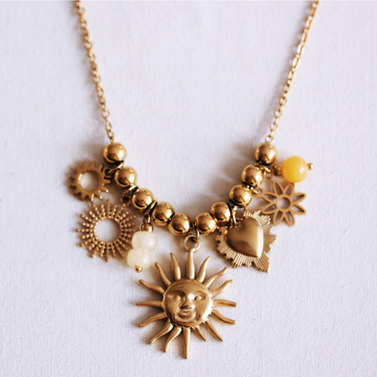 Beaded necklace with charms ‘Kissed by the Sun’