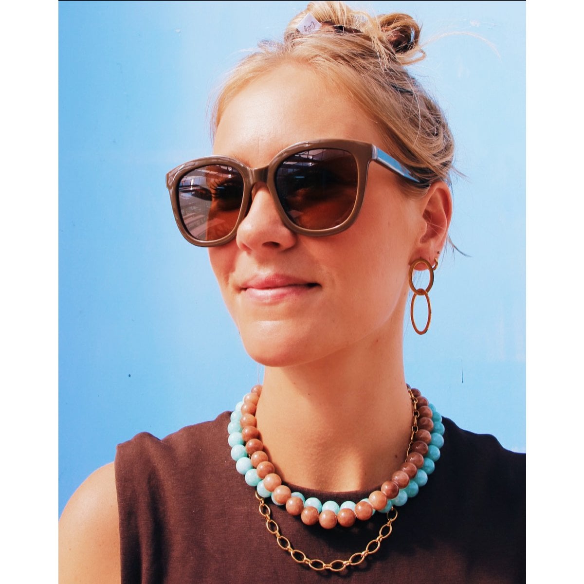 Earrings with linked oval rings - gold