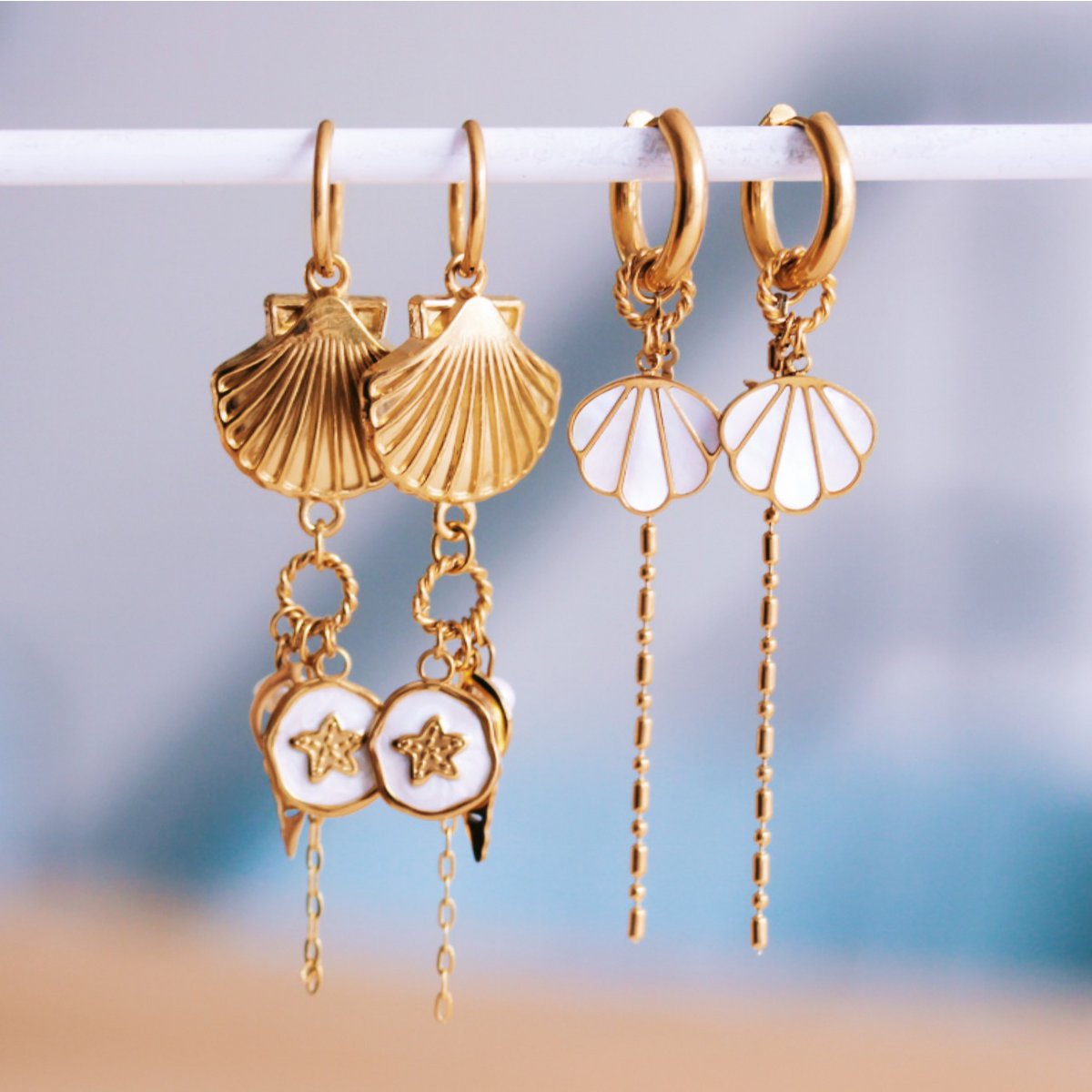 Wide hoop earrings with twisted ring, shell, starfish and small chain - mother-of-pearl